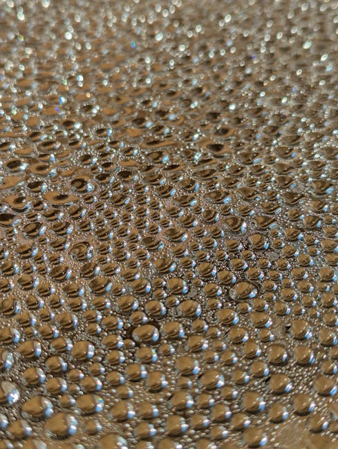 Seamless hex wallpaper pattern — Geometry by wallpaper⁶ — base photo: Macro image of sparkling dew drops creating a mesmerizing pattern on a golden background.