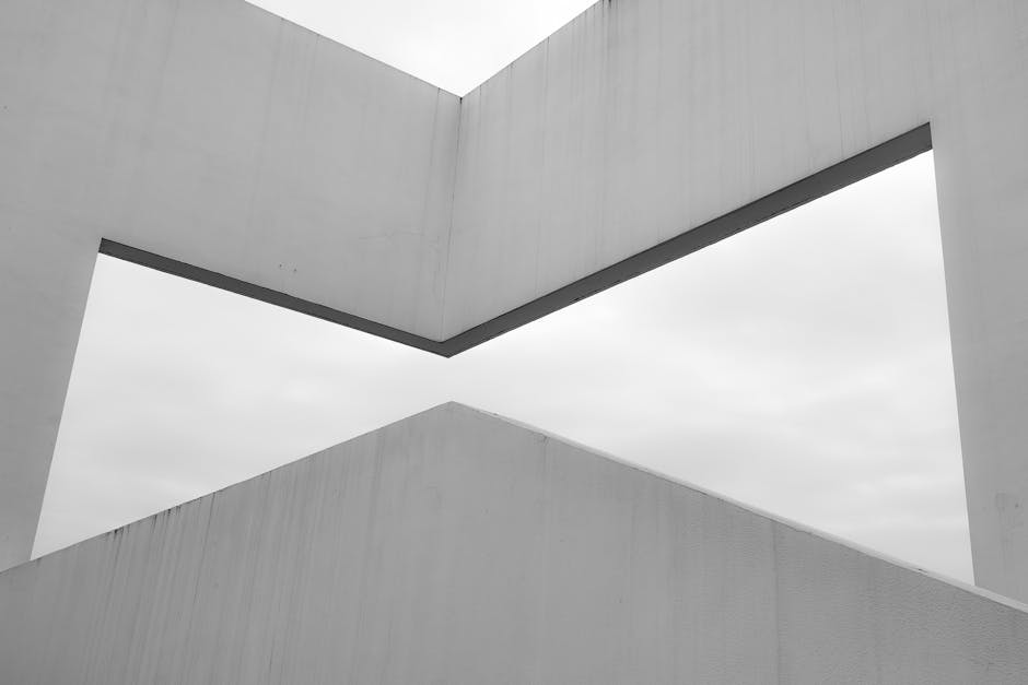 Seamless kaleidoscope wallpaper pattern — Geometry by wallpaper⁶ — base photo: Monochrome architectural image showcasing minimalist and abstract geometric shapes.