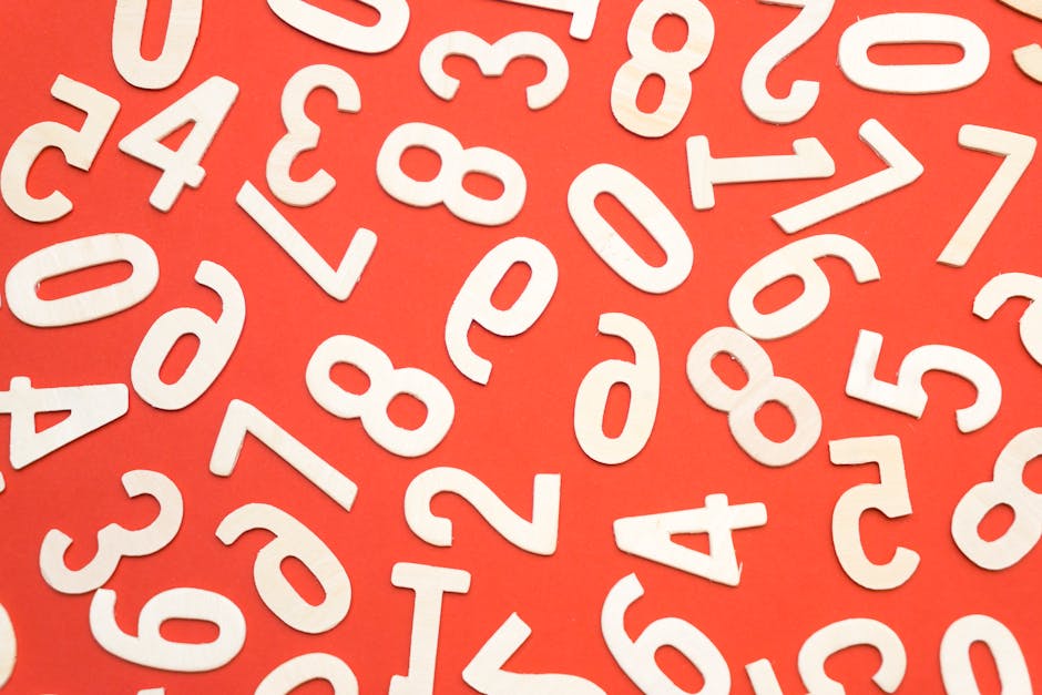 Cryptography Rotation wallpaper pattern — base photo: Artistic scattered white numbers on a bright red background, geometric and abstract.