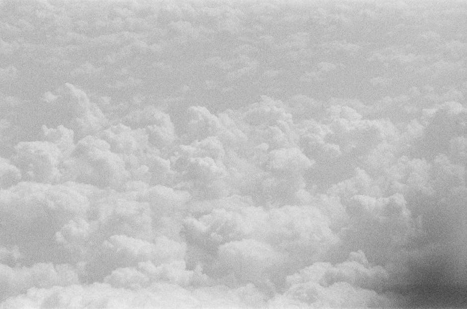 Meteorology Wave wallpaper pattern — base photo: A dramatic black and white aerial view showcasing a vast cloudscape.