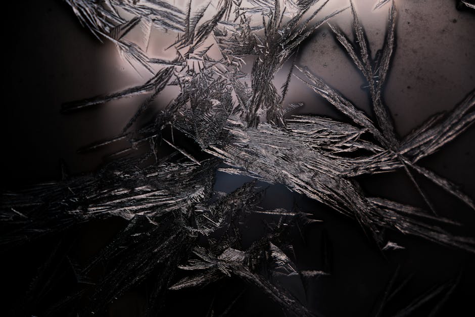 3D Kaleidoscope wallpaper pattern — base photo: Artistic close-up of intricate ice crystal formations, showcasing sharp details and abstract shapes.