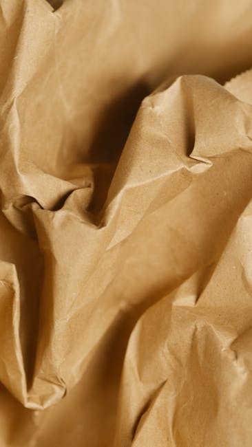 Seamless diamond wallpaper pattern — Origami by wallpaper⁶ — base photo: Detailed close-up image of crumpled brown paper, highlighting texture and folds.