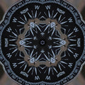 A radial, kaleidoscopic pattern formed from vintage maps with sepia tones and intricate navigational lines in a six-fold symmetry.