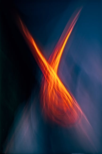 Seamless kaleidoscope wallpaper pattern — Astronomy by wallpaper⁶ — base photo: Dynamic abstract image with vibrant orange streaks on a deep blue background.