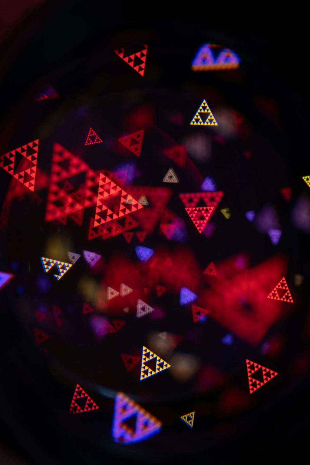 Fractals Pinwheel wallpaper pattern — base photo: Abstract triangles of red, yellow, and blue light