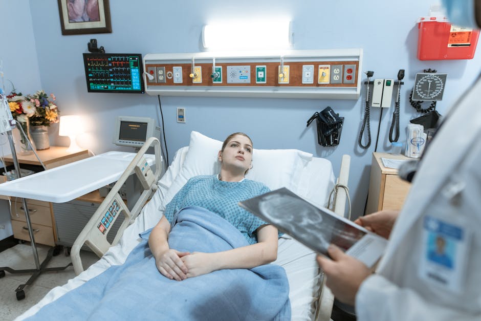 Seamless kaleidoscope wallpaper pattern — Medicine by wallpaper⁶ — base photo: A female patient in a hospital gown receives medical attention from a healthcare professional holdin