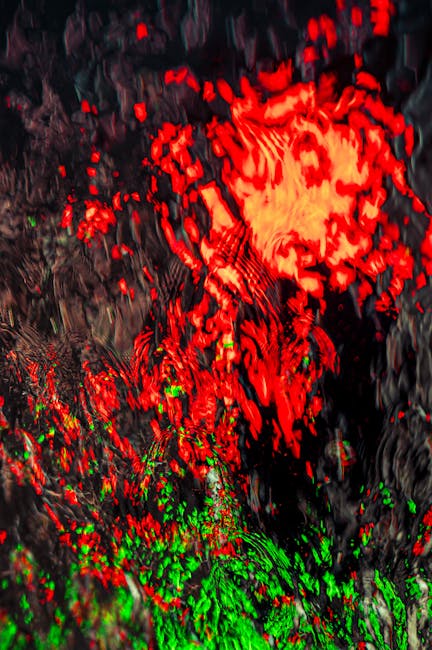 Seamless kaleidoscope wallpaper pattern — Glitch by wallpaper⁶ — base photo: Eye-catching abstract artwork featuring intense red and green hues with a dynamic texture.