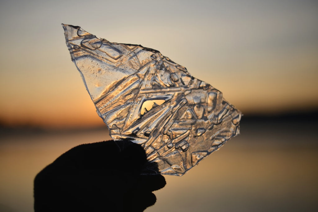 Seamless diamond wallpaper pattern — Stained Glass by wallpaper⁶ — base photo: A person holding a piece of glass in their hand