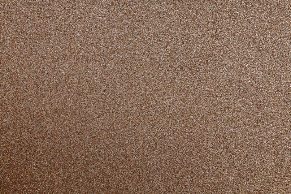 Seamless kaleidoscope wallpaper pattern — Calligraphy by wallpaper⁶ — base photo: Close-up of a brown glittery texture with abstract design, perfect for backgrounds.