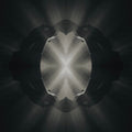 A mirrored portrait pattern in deep tones showing a symmetrical repetition of faces in a dark, classical art style.
