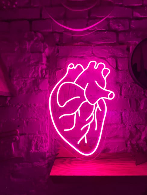 Seamless kaleidoscope wallpaper pattern — Medicine by wallpaper⁶ — base photo: Glowing pink neon heart sign on a brick wall in Kyiv, Ukraine.