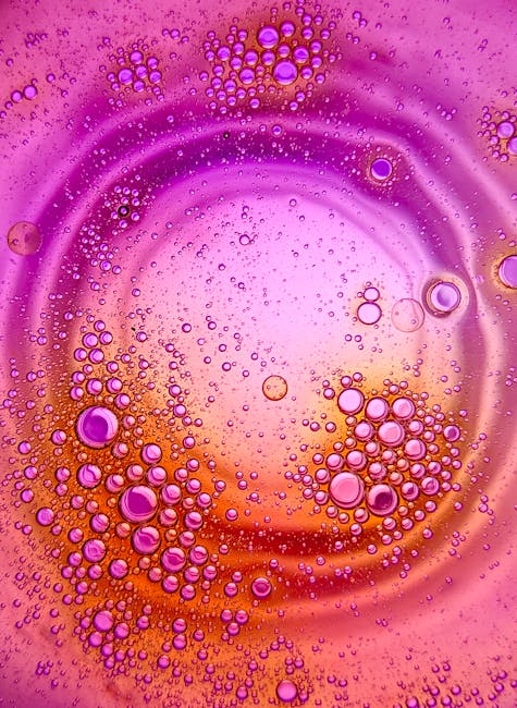 Physics Hexagon wallpaper pattern — base photo: Abstract oil bubbles in water creating a vibrant purple and orange artistic pattern.