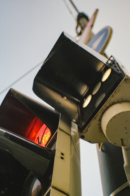 Seamless kaleidoscope wallpaper pattern — Biochemistry by wallpaper⁶ — base photo: Detailed view of a traffic light with red signal in Bratislava, Slovakia.