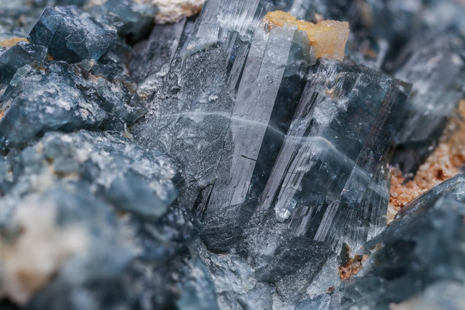 Close-up of natural blue mineral crystal formations with hex symmetry, showcasing intricate textures and geometric patterns on wallpaper. — base photo: A macro photograph revealing the structured, angular beauty of natural blue mineral crystals. The im