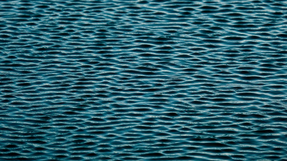 Oceanography Mirror wallpaper pattern — base photo: A serene close-up of ocean water with smooth ripples, highlighting calmness and tranquility.