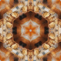 A mesmerizing kaleidoscope pattern derived from a gemstone close-up, featuring repeating geometric shapes in white and brown tones.