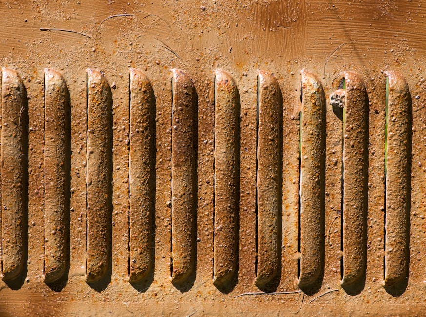 Statistics Hexagon wallpaper pattern — base photo: Detailed view of a rusty, weathered metal surface with unique texture and color patterns.