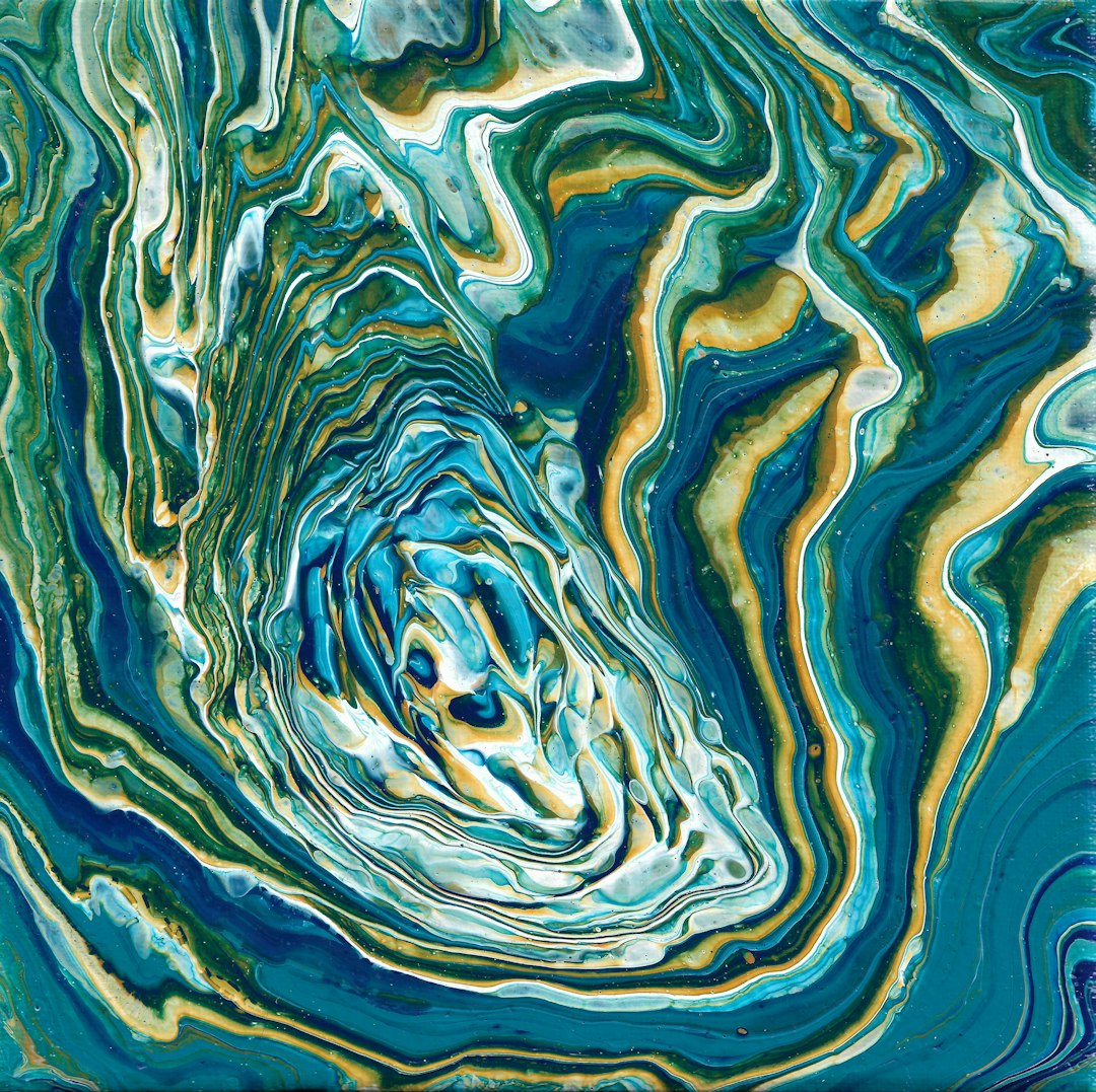A radial blue and white geometric pattern with Kaleidoscope symmetry, resembling shattered glass or a crystalline starburst. — base photo: A high-contrast photograph of modern architectural elements, featuring sharp metallic edges, glass r
