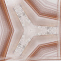 A hexagonal pattern of deep emerald green crystals and dark mineral veins in a symmetrical kaleidoscope arrangement.