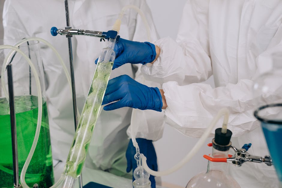 Molecular Physics Kaleidoscope wallpaper pattern — base photo: Researchers in protective gear conducting a chemistry experiment with laboratory apparatus.