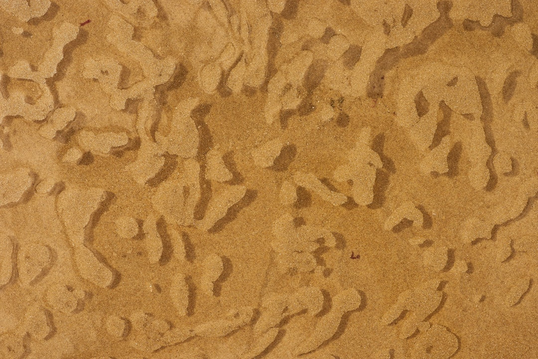 Seamless hex wallpaper pattern — Geometry by wallpaper⁶ — base photo: brown and black sand during daytime