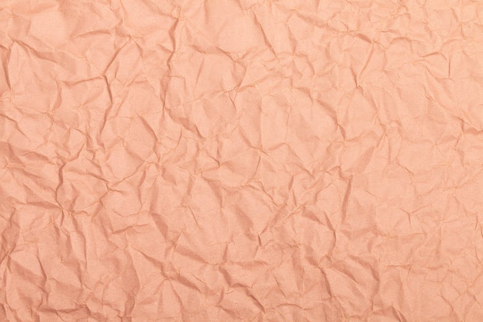 Seamless diamond wallpaper pattern — Origami by wallpaper⁶ — base photo: Abstract image of crumpled brown paper, perfect for background or texture use.