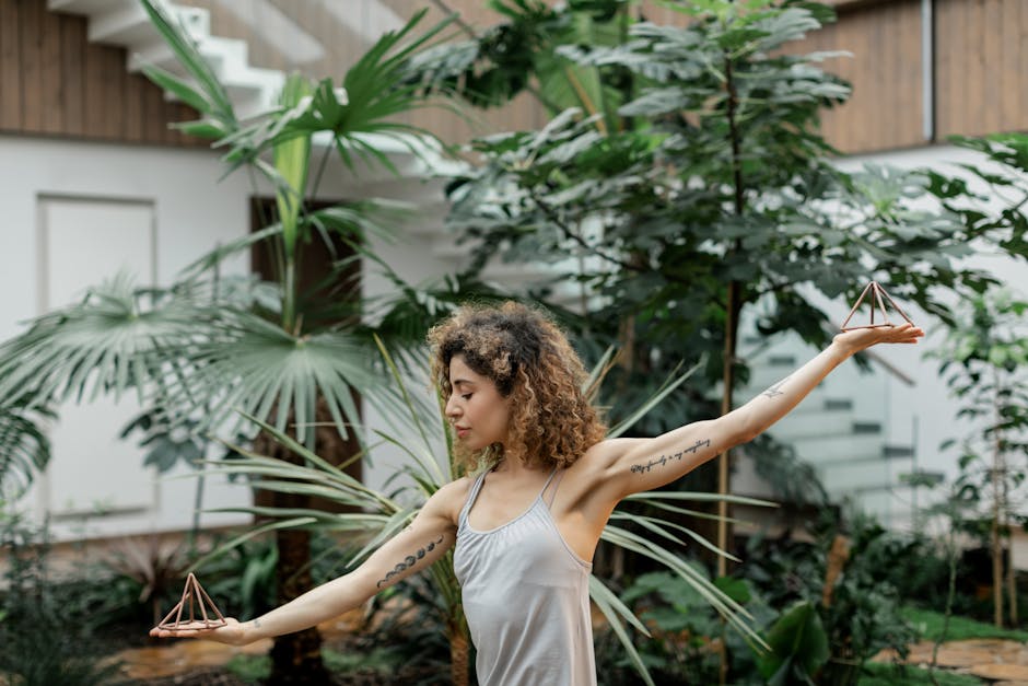 Seamless kaleidoscope wallpaper pattern — Geometry by wallpaper⁶ — base photo: A woman in sportswear practicing balance amidst lush indoor greenery, embracing wellness.