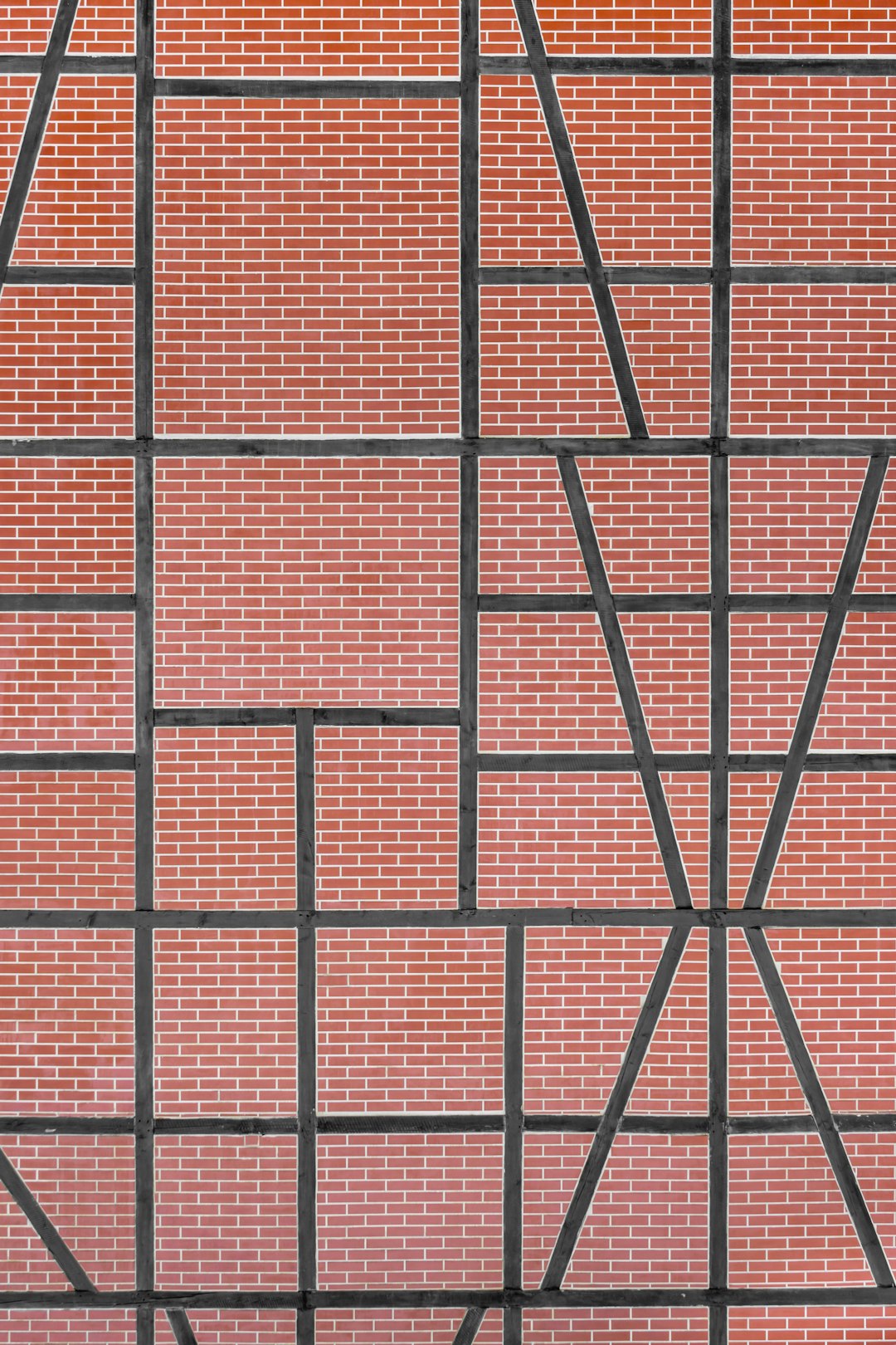 Brown tile pattern with rotational symmetry inspired by Transformer AI, creating a sophisticated and modern wall design. — base photo: A close-up, textured shot of brown tiles arranged in a tactile, earthy composition. The lighting hig