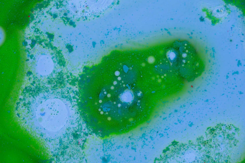 Seamless mirror wallpaper pattern — Medicine by wallpaper⁶ — base photo: An abstract image featuring a vibrant mix of green and blue paint creating fluid patterns.