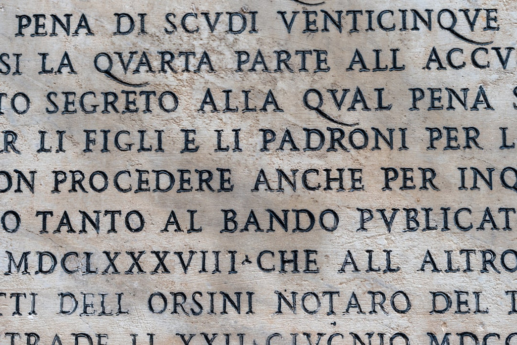 Seamless mirror wallpaper pattern — Calligraphy by wallpaper⁶ — base photo: Detail of marble inscription in Italian dated 1688 forbidding people to litter the street in Rome, I