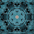 Close-up of a decorative stained glass window with a blue metallic leaf design, showcased in a kaleidoscope repeat pattern for wallpaper.