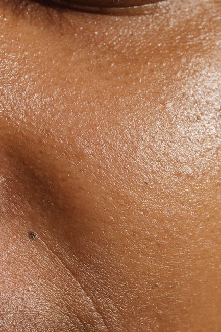Portraits Kaleidoscope wallpaper pattern — base photo: High-resolution close-up of human skin showing pores and texture for dermatology study.
