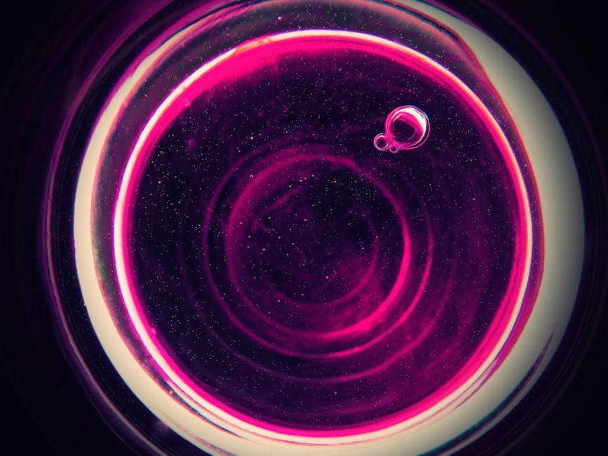 Seamless hex wallpaper pattern — Calligraphy by wallpaper⁶ — base photo: Vibrant abstract pink bubbles forming a circular pattern against a dark background, creating a cosmi