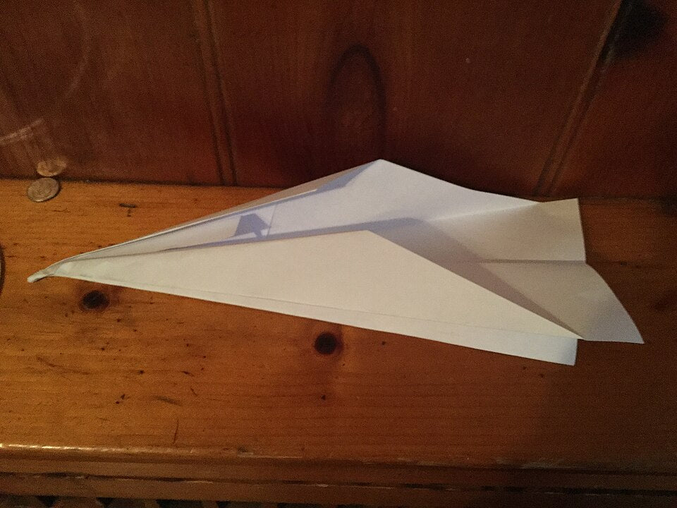 Seamless mirror wallpaper pattern — Origami by wallpaper⁶ — base photo: File:White paper airplane.jpg