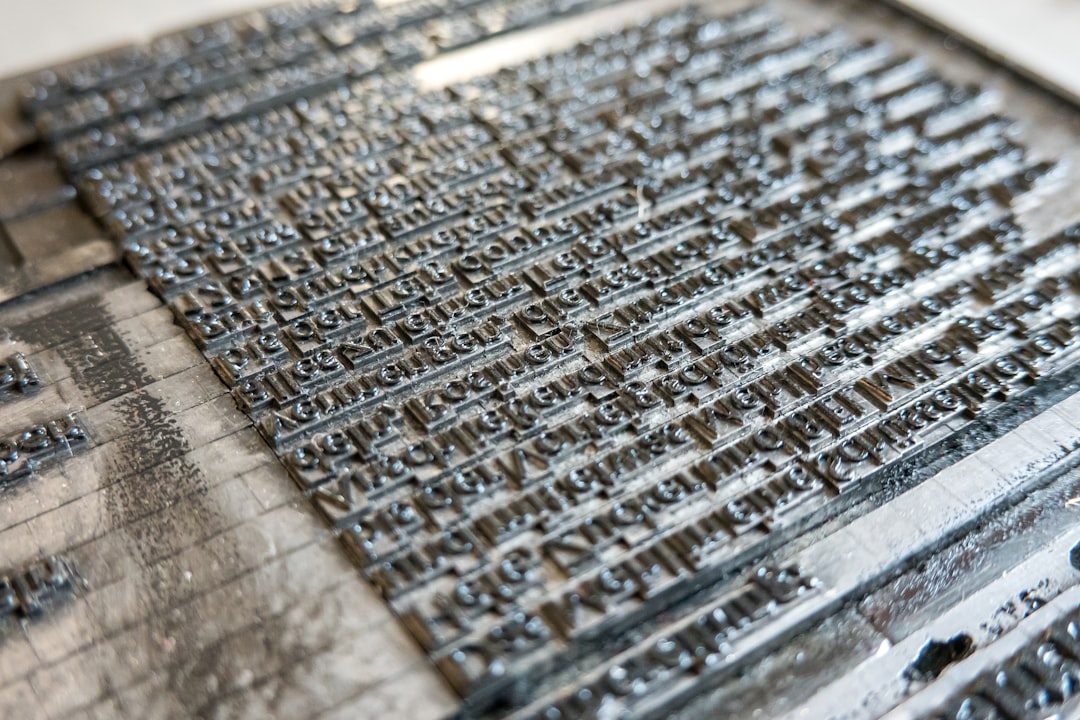 Seamless hex wallpaper pattern — Calligraphy by wallpaper⁶ — base photo: german text in lead typesetting at a print shop