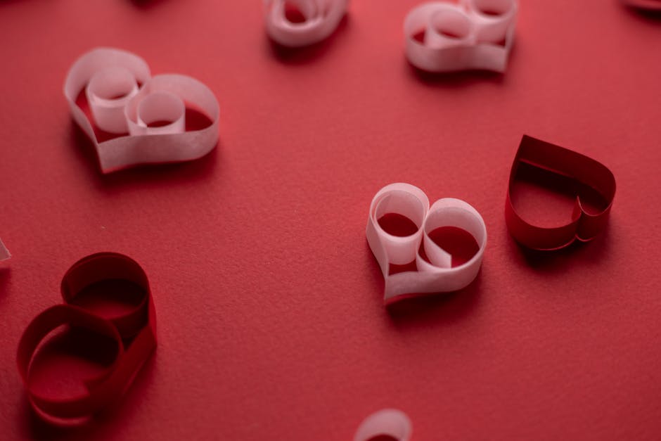Seamless mirror wallpaper pattern — Origami by wallpaper⁶ — base photo: From above of small cutout heart shaped decorations for celebrating romantic event Saint Valentines 