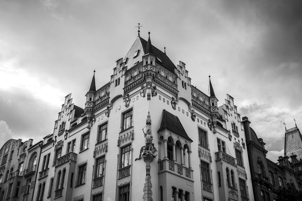 Meteorology Hexagon wallpaper pattern — base photo: A black and white photo of a building in Prague.