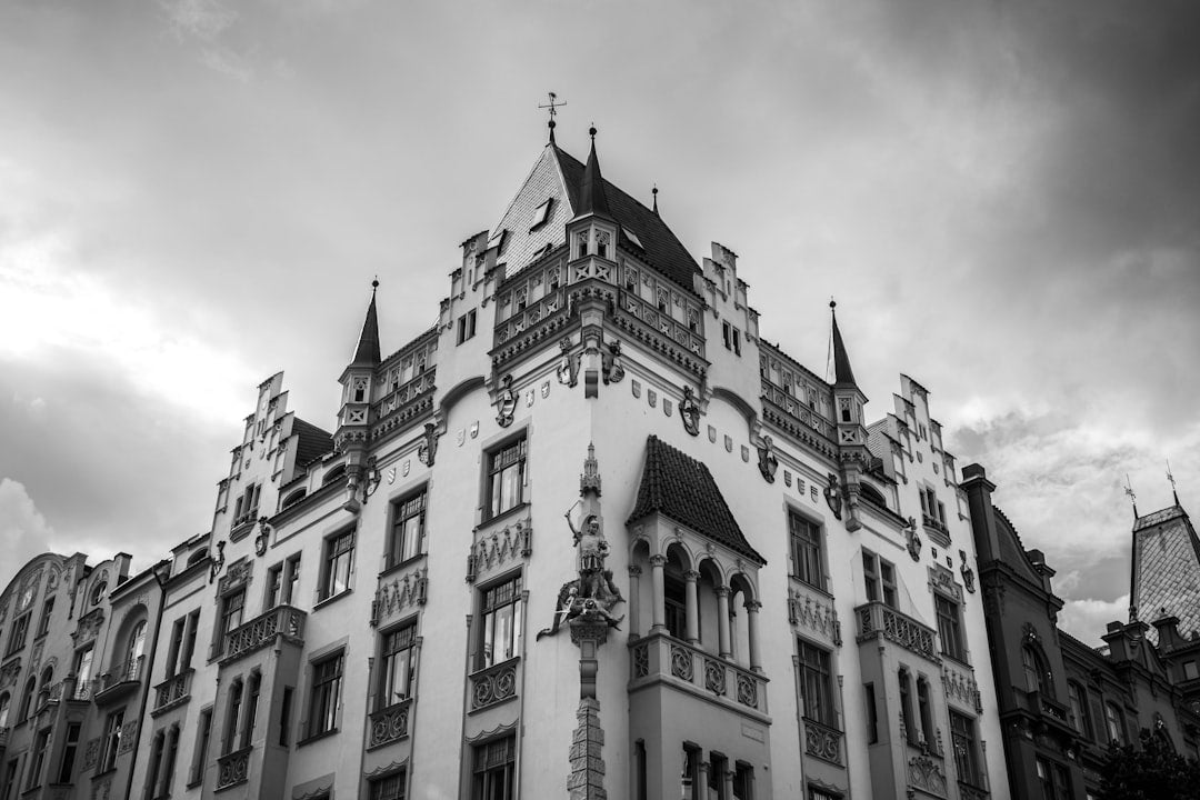 Meteorology Hexagon wallpaper pattern — base photo: A black and white photo of a building in Prague.