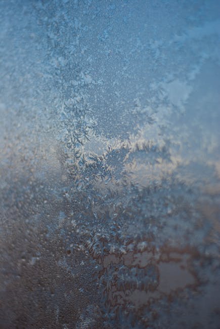 Seamless diamond wallpaper pattern — Stained Glass by wallpaper⁶ — base photo: Detailed frost patterns on a window capture the essence of winter in this close-up shot.