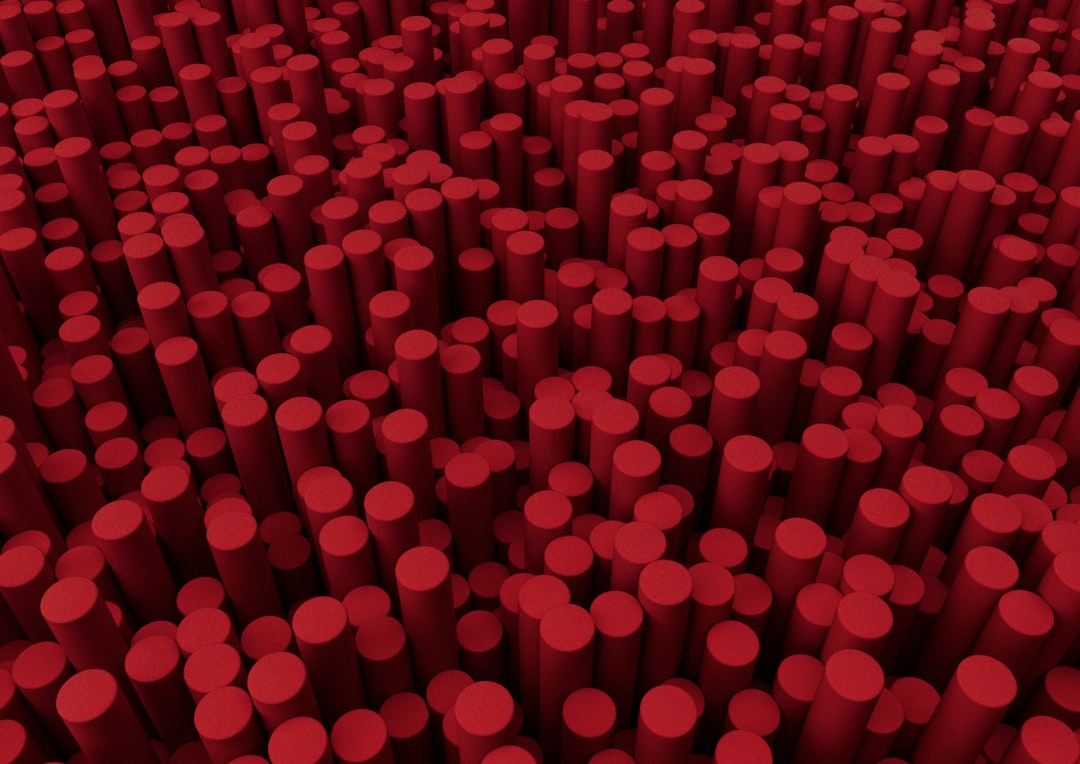 Abstract 3D isometric pattern of red tubes, showcasing rotational symmetry, ideal for modern decor. Wallpaper design. — base photo: A detailed 3D render of an abstract pattern composed of sleek, interconnected red tubes. The isometr