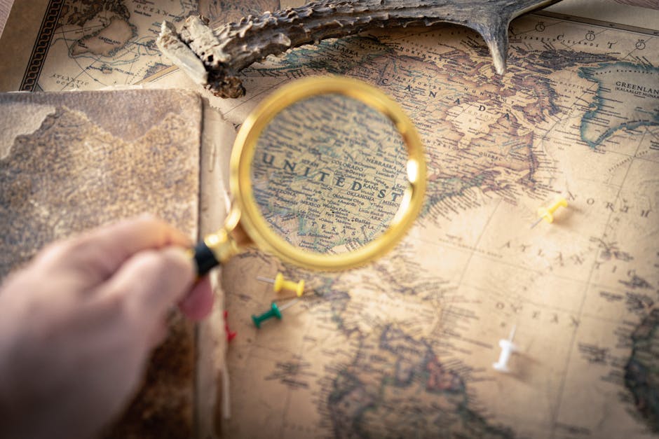 Seamless mirror wallpaper pattern — Cartography by wallpaper⁶ — base photo: Hand holding magnifying glass over vintage USA map, capturing exploration and discovery theme.