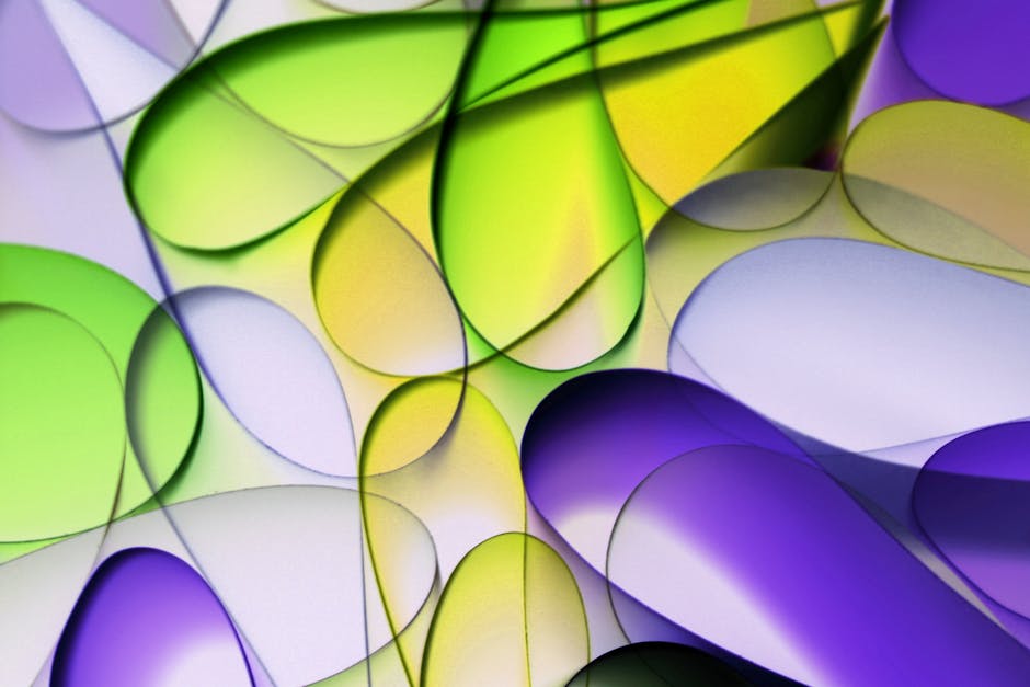 Fractals Kaleidoscope wallpaper pattern — base photo: Abstract artwork with overlapping green, yellow, and purple shapes creating a vibrant design.