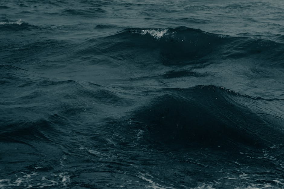 Oceanography Wave wallpaper pattern — base photo: Captivating waves crashing in the ocean at Canoa Quebrada, creating a moody seascape.