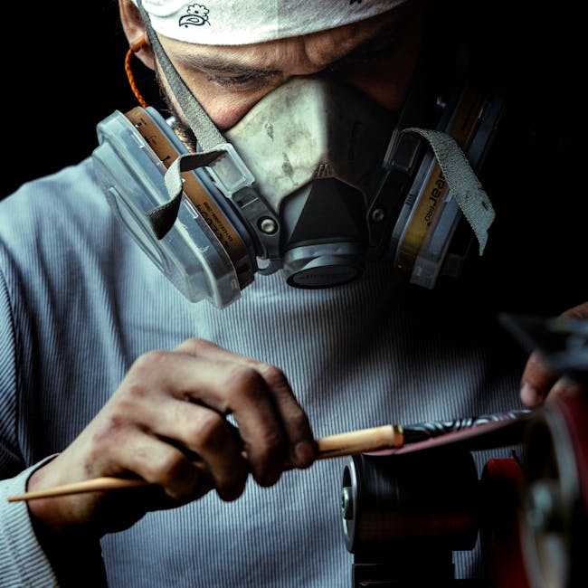 Seamless wave wallpaper pattern — Calligraphy by wallpaper⁶ — base photo: Close-up of a masked artisan carefully crafting with tools, showcasing skill and precision.