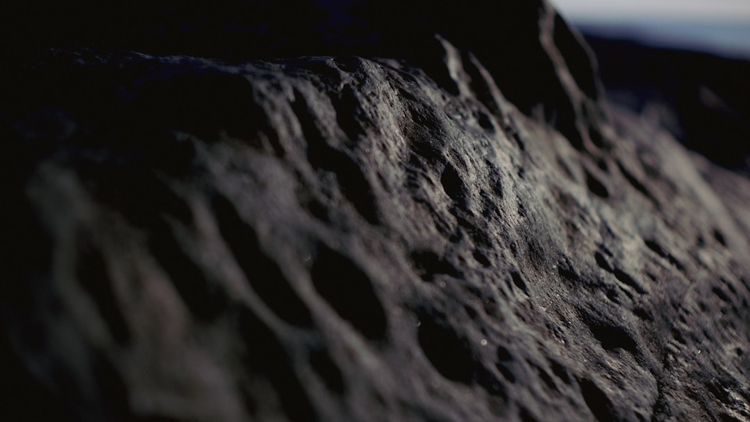 Seamless hex wallpaper pattern — Astronomy by wallpaper⁶ — base photo: a close up of a rock with a sky in the background