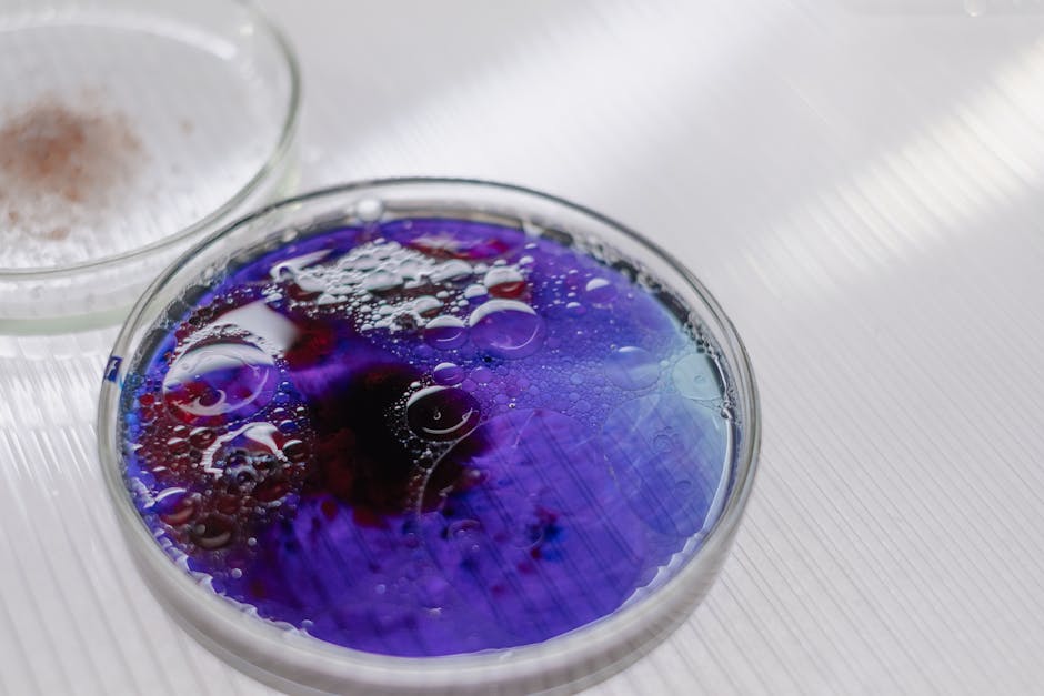 Chemistry Hexagon wallpaper pattern — base photo: Purple liquid with bubbles in a petri dish, showcasing a scientific experiment.