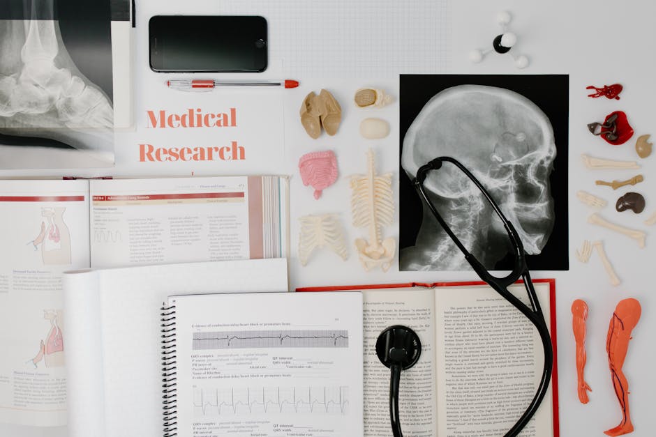 Seamless hex wallpaper pattern — Medicine by wallpaper⁶ — base photo: Overhead view of medical research equipment and study materials including books, x-rays, and stethos