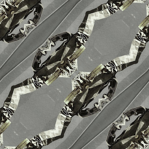 Geometric pattern inspired by origami paper folds, arranged in a diamond symmetry, from wallpaper⁶.