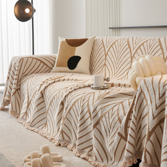 Seamless pinwheel wallpaper pattern — Stained Glass by wallpaper⁶ — base photo: A contemporary living room with a cozy patterned sofa and decorative pillows.