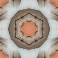 A radial kaleidoscopic pattern made from vintage brown maps and nautical charts, forming a geometric star-like symmetry.